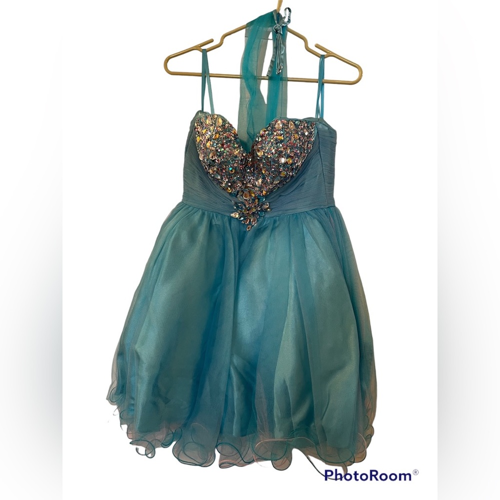 Cute baby blue with hints of pink dress. Beautiful beadwork and embellishments!